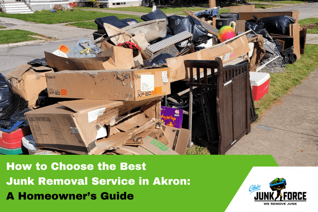 Large pile of household junk including boxes, bags, furniture, and coolers on grassy driveway beside house; green Ohio Junk Force banner title "How to Choose the Best Junk Removal Service in Akron: A Homeowner's Guide."